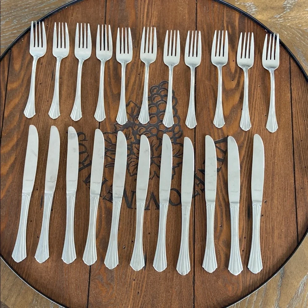 Oneida Stainless Flatware Dinner Knives and Forks set.
